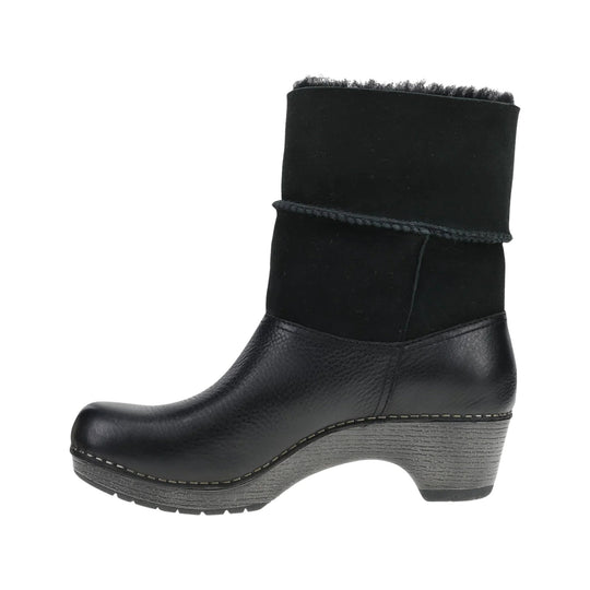 Black ankle boot with a suede shaft, leather foot, and gray stacked heel