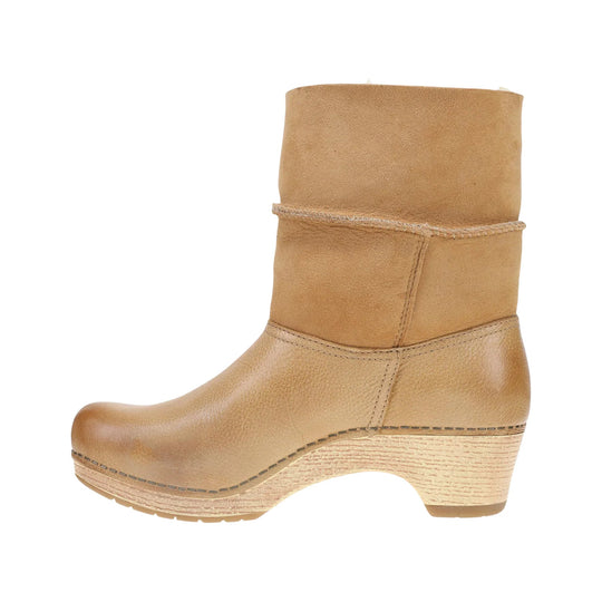Tan suede ankle boot with round toe, folded shaft, and wood-look wedge heel