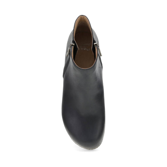 Black ankle boot viewed from above with side zippers and a rounded toe