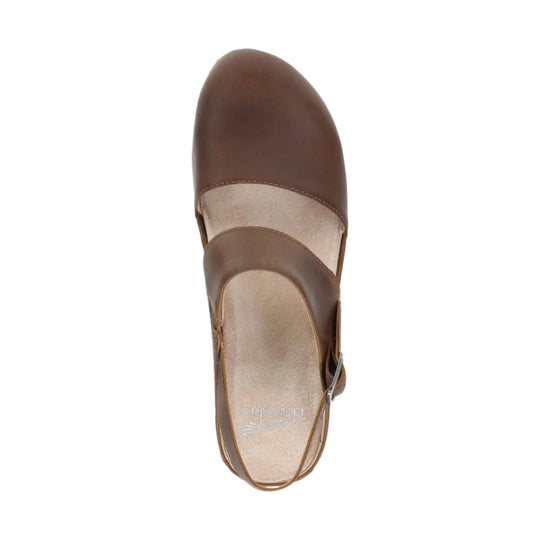 Brown closed-toe slingback clog with a tan footbed and stitched leather panels