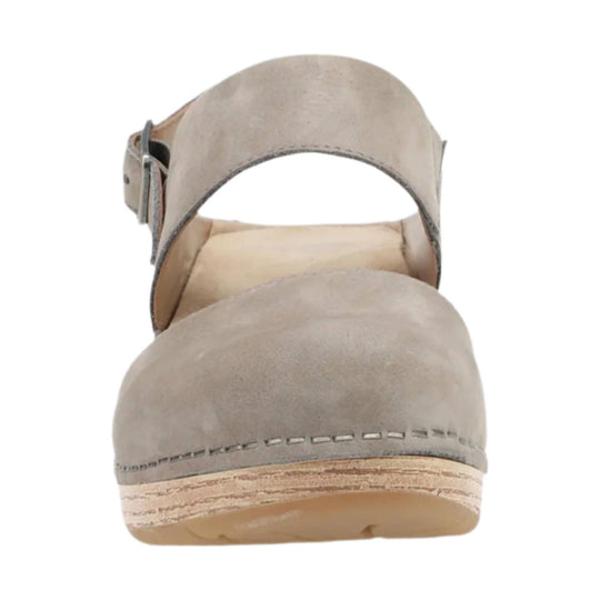 Taupe suede clog-style sandal with an open heel and ankle strap buckle