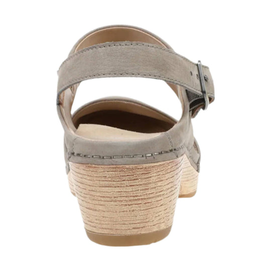 Taupe suede wedge sandal with ankle strap and metal buckle, rear view