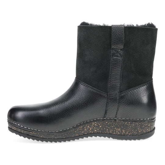 Black pull-on ankle boot with suede shaft, leather lower, and cork-speckled platform sole