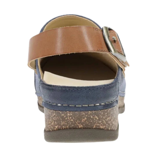 Back view of a brown leather mule with a wide strap, metal buckle, and blue suede heel