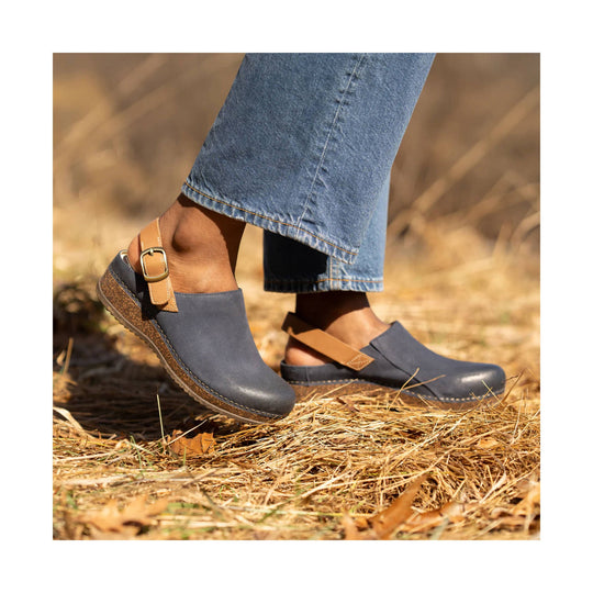 Blue suede mule clogs with tan ankle straps and wooden soles