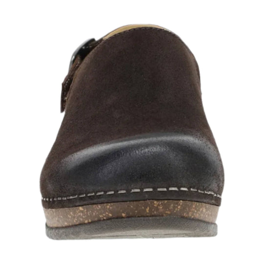 Brown suede mule with a rounded toe, dark toe cap, and light speckled cork-style sole