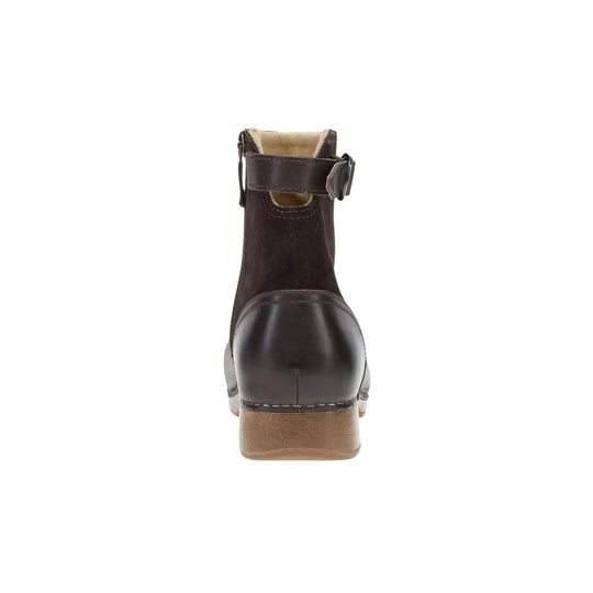 Brown ankle boot with a heel strap and buckle, seen from the back