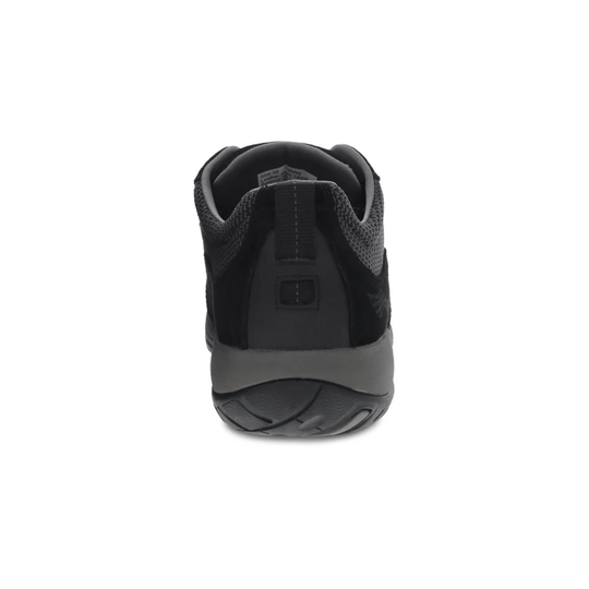 Black low-top sneaker shown from the back with textured knit panels, padded collar, and gray heel wedge