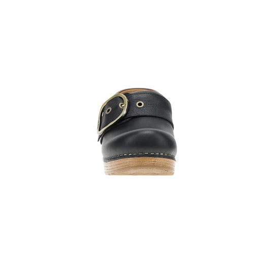 Black leather clog mule with a large buckle strap and tan wood-look sole, front view