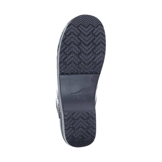 Black shoe outsole with herringbone tread, Dansko logo, and size 38 marking