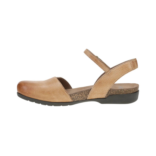 Tan distressed leather closed-toe sandal with wide side strap, ankle strap, and black sole