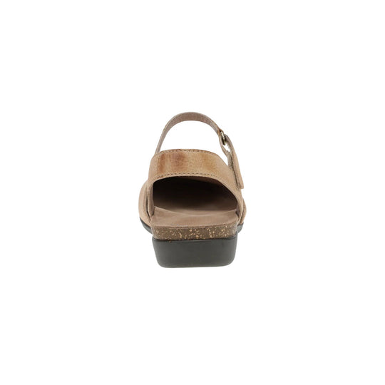 Rear view of a tan suede slingback sandal with an ankle strap and dark wedge sole