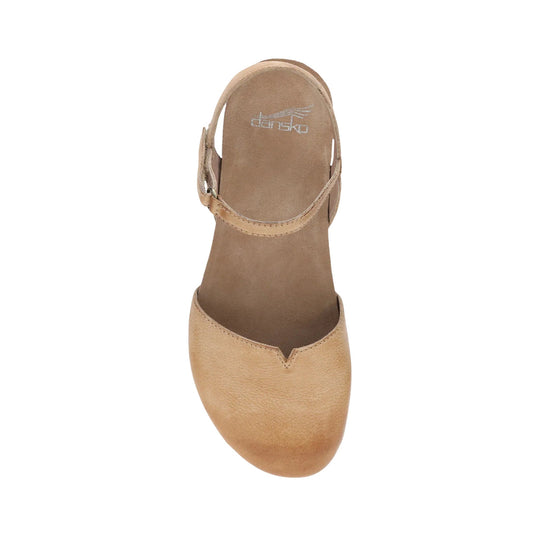 Tan closed-toe slingback clog with a low wedge and suede footbed, viewed from above