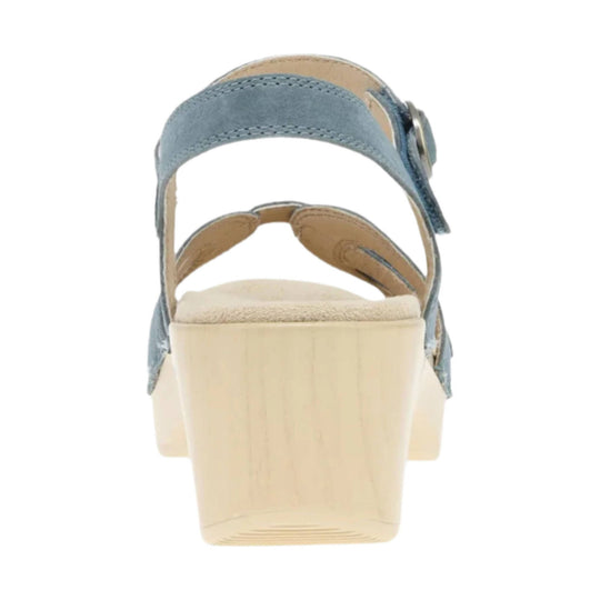 Blue ankle-strap wedge sandal with cork-look heel and side buckle, rear view