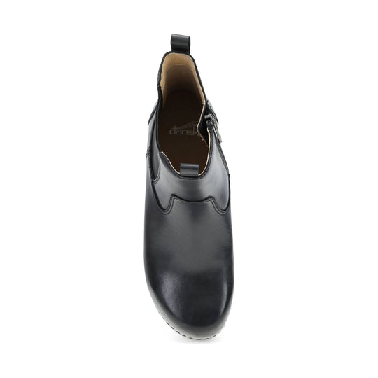 Black leather ankle boot viewed from above with side zipper and pull tabs