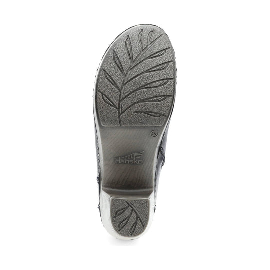 Gray boot sole with leaf tread pattern and Dansko logo