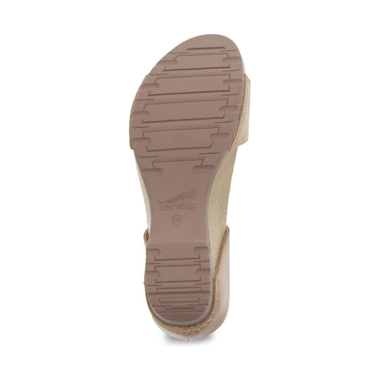 Beige sandal sole with Dansko logo and size 38