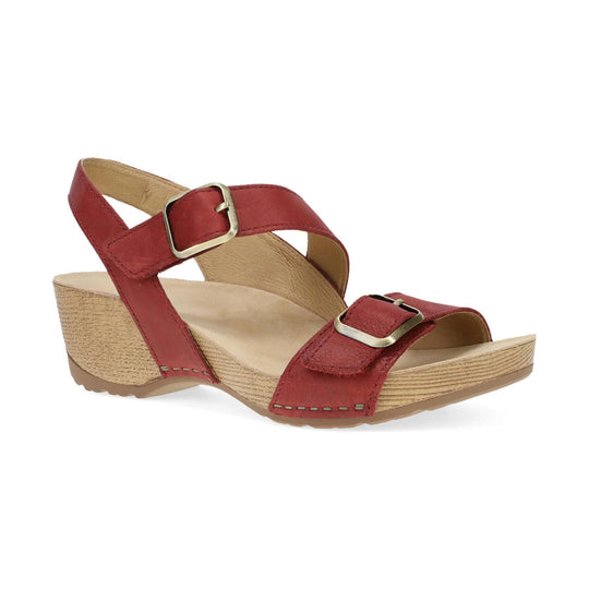 Red leather wedge sandal with two buckled straps and a cork-look heel