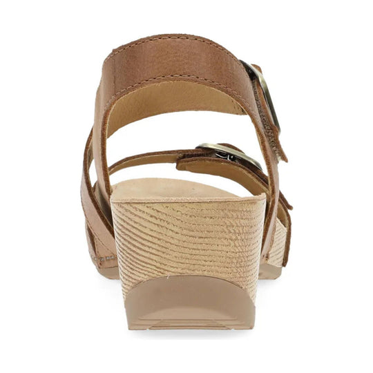 Tan strappy wedge sandal viewed from the back with an espadrille-style heel