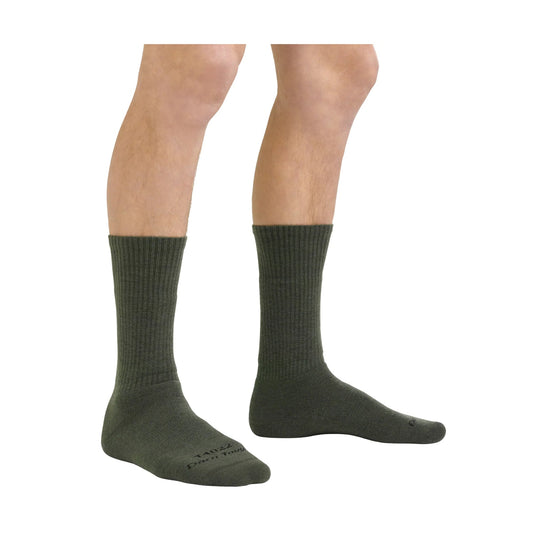 Olive green ribbed boot socks on a model’s lower legs, shown in side view