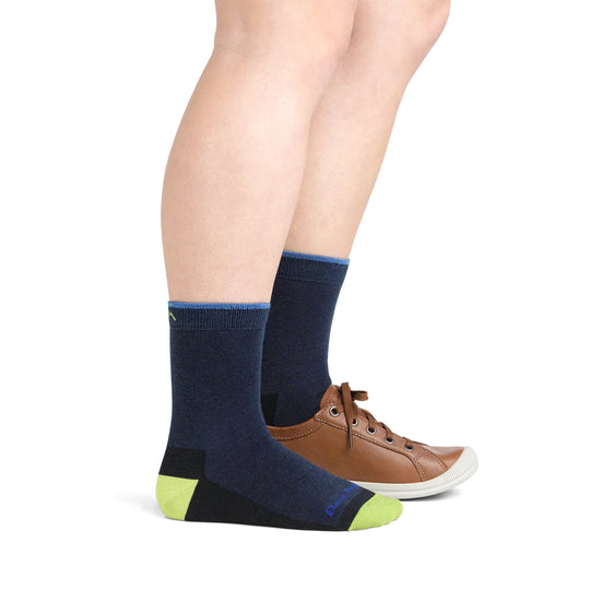 Kids’ navy hiking socks with lime toes and heels, shown with brown lace-up shoes