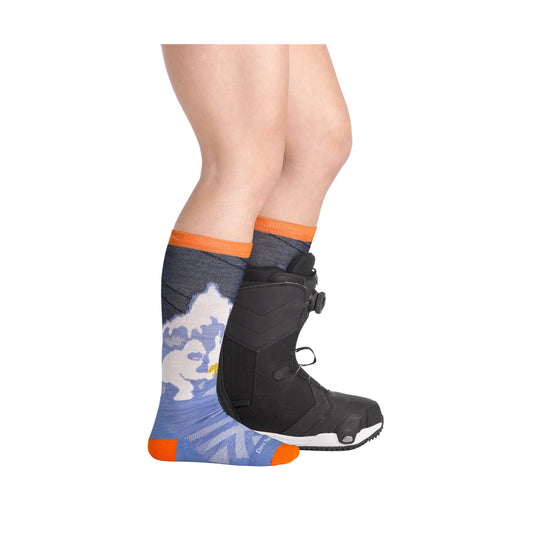 Blue over-the-calf ski sock with orange cuff, toe, and heel, shown with a black snowboard boot