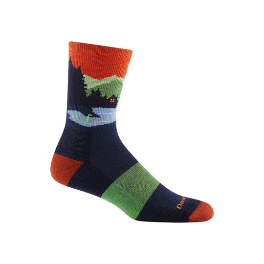 Midweight crew hiking sock with orange cuff and toe, navy body, and green mountain pattern