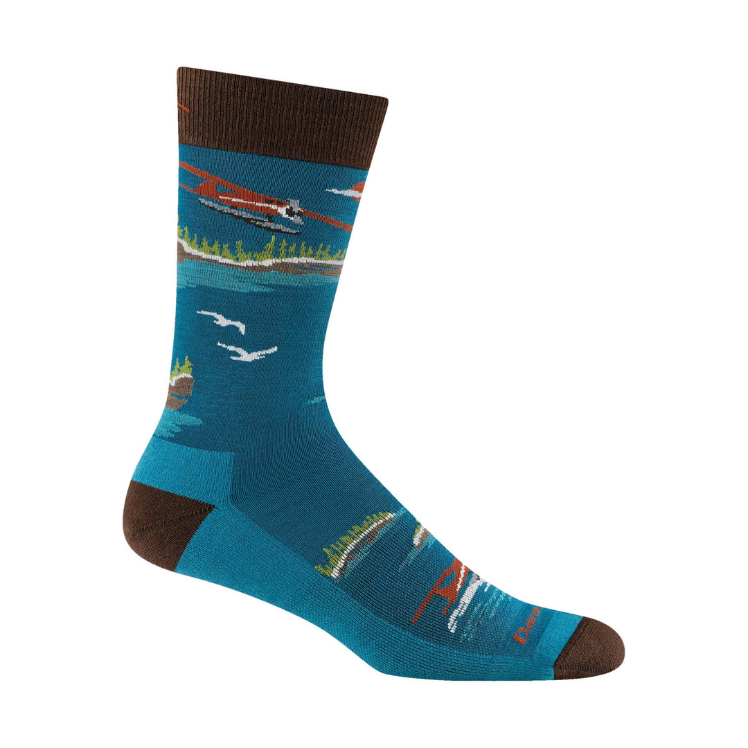 Blue crew sock with brown heel and toe and a floating plane pattern