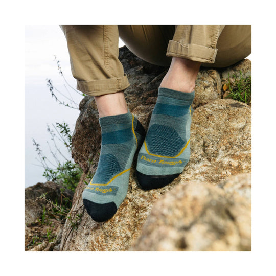 Ankle hiking socks in blue-green tones with yellow trim and visible Darn Tough text