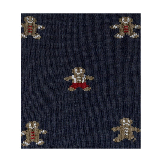 Navy knit sock with repeating gingerbread man pattern