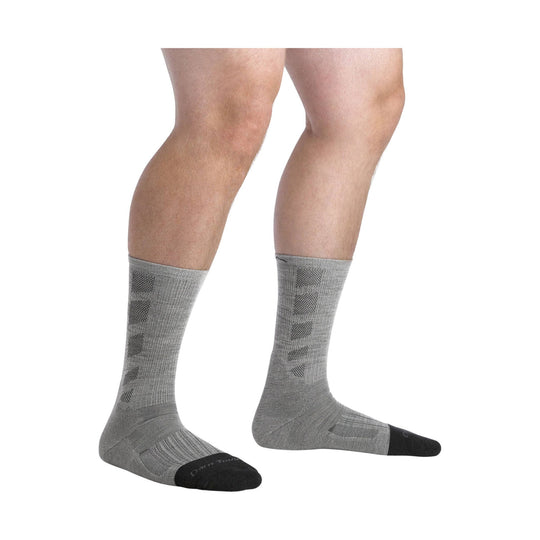 Gray knee-high socks with black reinforced toes and heels, shown on model legs