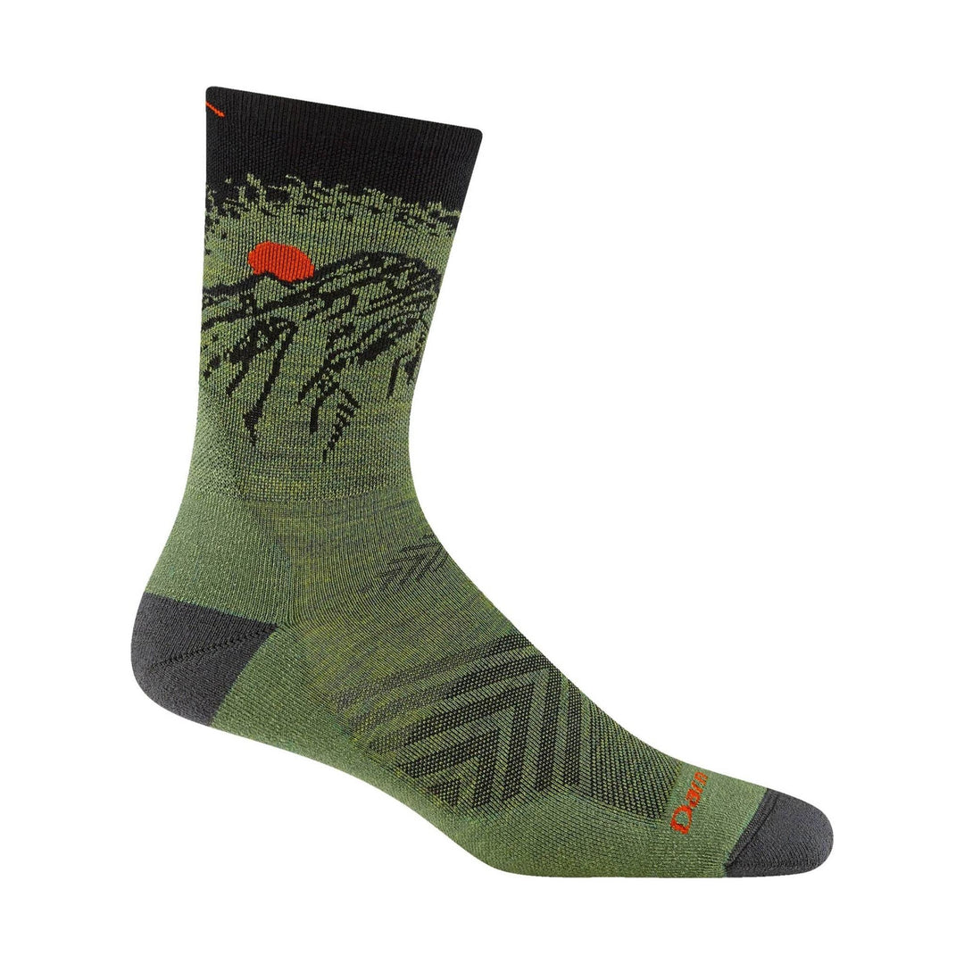 Olive green crew sock with black heel and toe, mountain pattern, and orange logo text