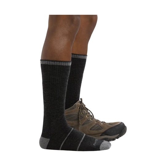 Black knee-high socks with gray toe and heel, worn with brown hiking boots