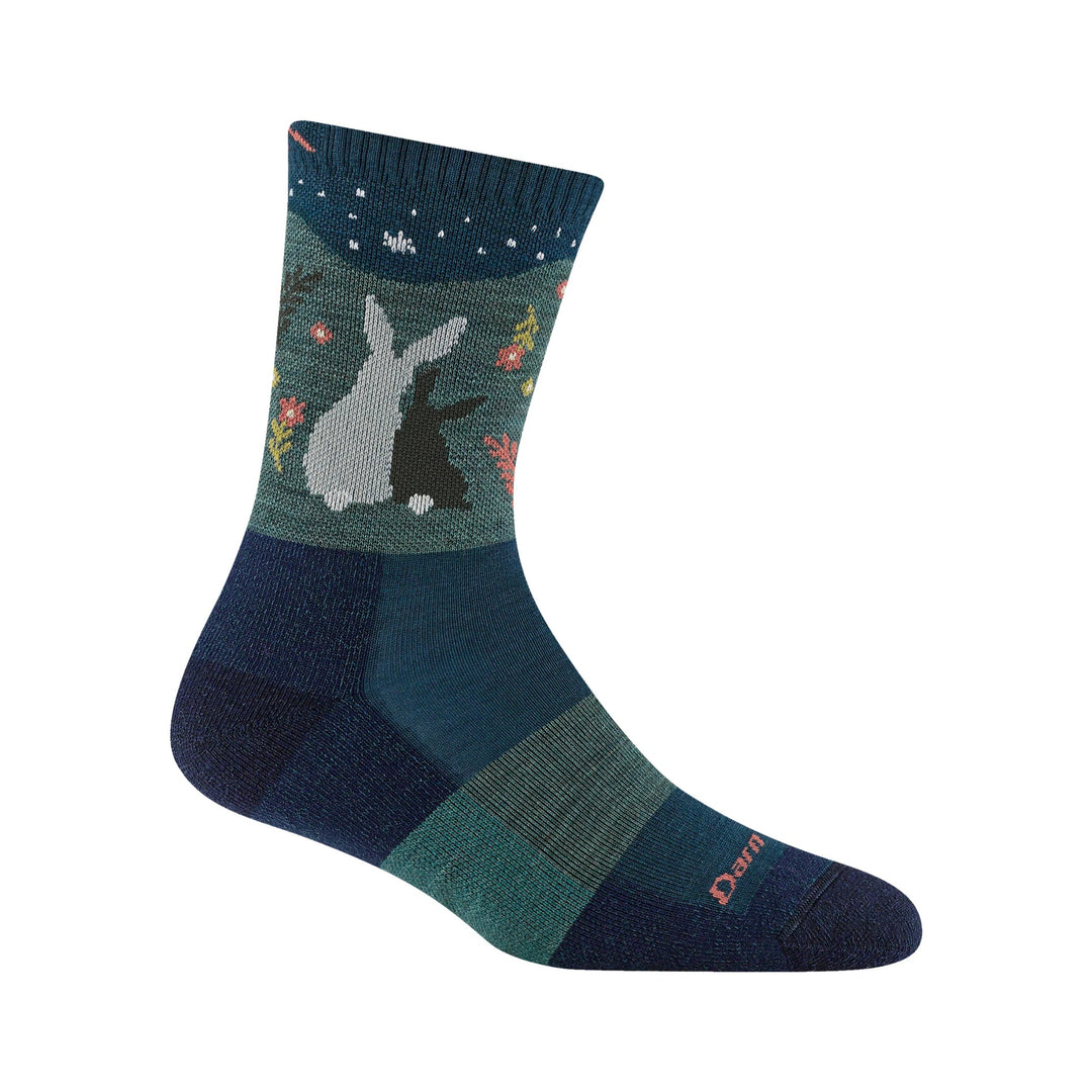 Blue and teal crew hiking sock with rabbit and floral pattern, and visible Darn Tough text near the toe