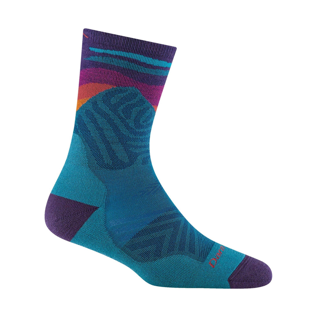 Colorful crew sock with teal, purple, and pink geometric pattern and a visible Darn logo