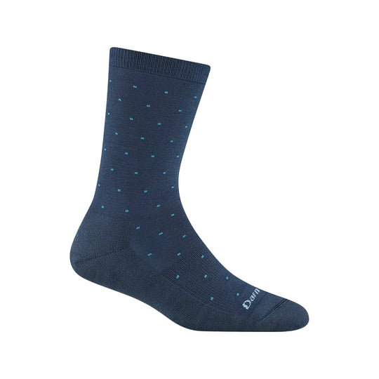 Navy crew sock with small light blue dots and Darn Tough logo near the toe