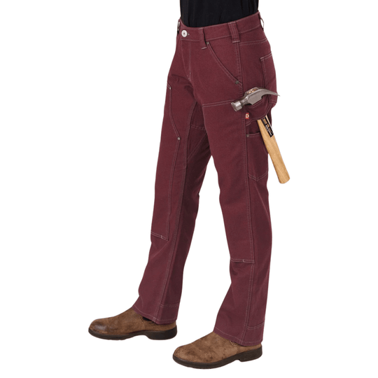 Maroon work pants with reinforced seams and tool pocket, shown with a hammer in the side pocket