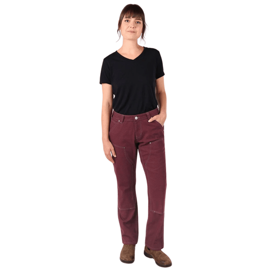 Women’s burgundy work pants with contrast stitching and front patch pockets, worn with a black T-shirt and brown boots