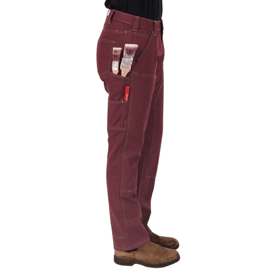 Maroon work pants with multiple utility pockets, shown with paintbrushes and work boots