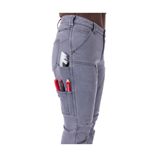 Gray utility work pants with multiple cargo pockets holding tools