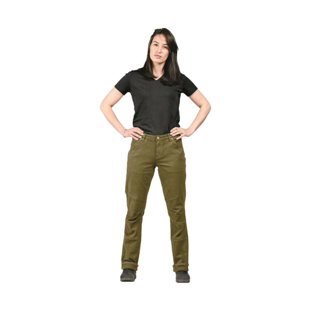 Woman wearing black short-sleeve V-neck T-shirt and olive green work pants, standing with hands on hips