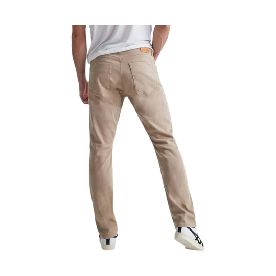 Tan relaxed taper pants shown from the back, with back pockets and a small waistband label
