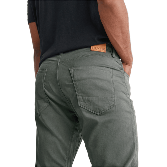Rear view of olive green straight-leg pants with back pockets and a leather DU/ER label