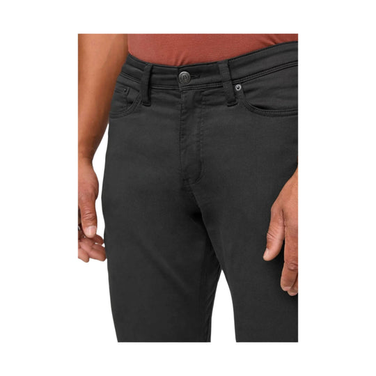 Black relaxed tapered pants with belt loops, front button, and five-pocket styling