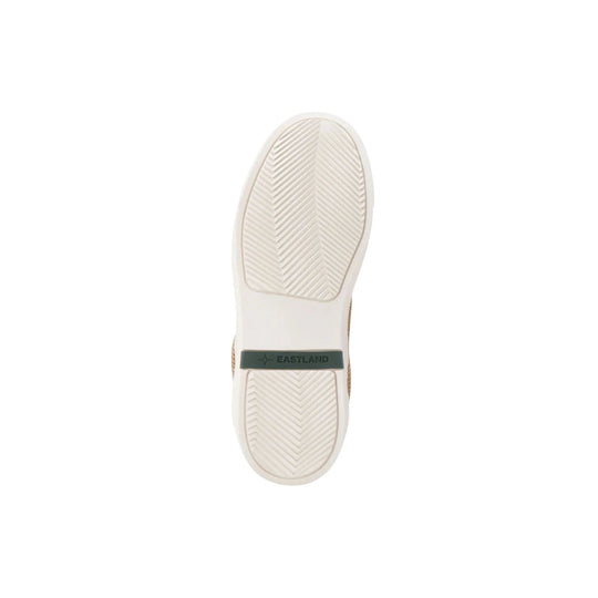 White sneaker sole with herringbone tread and an EASTLAND logo tab