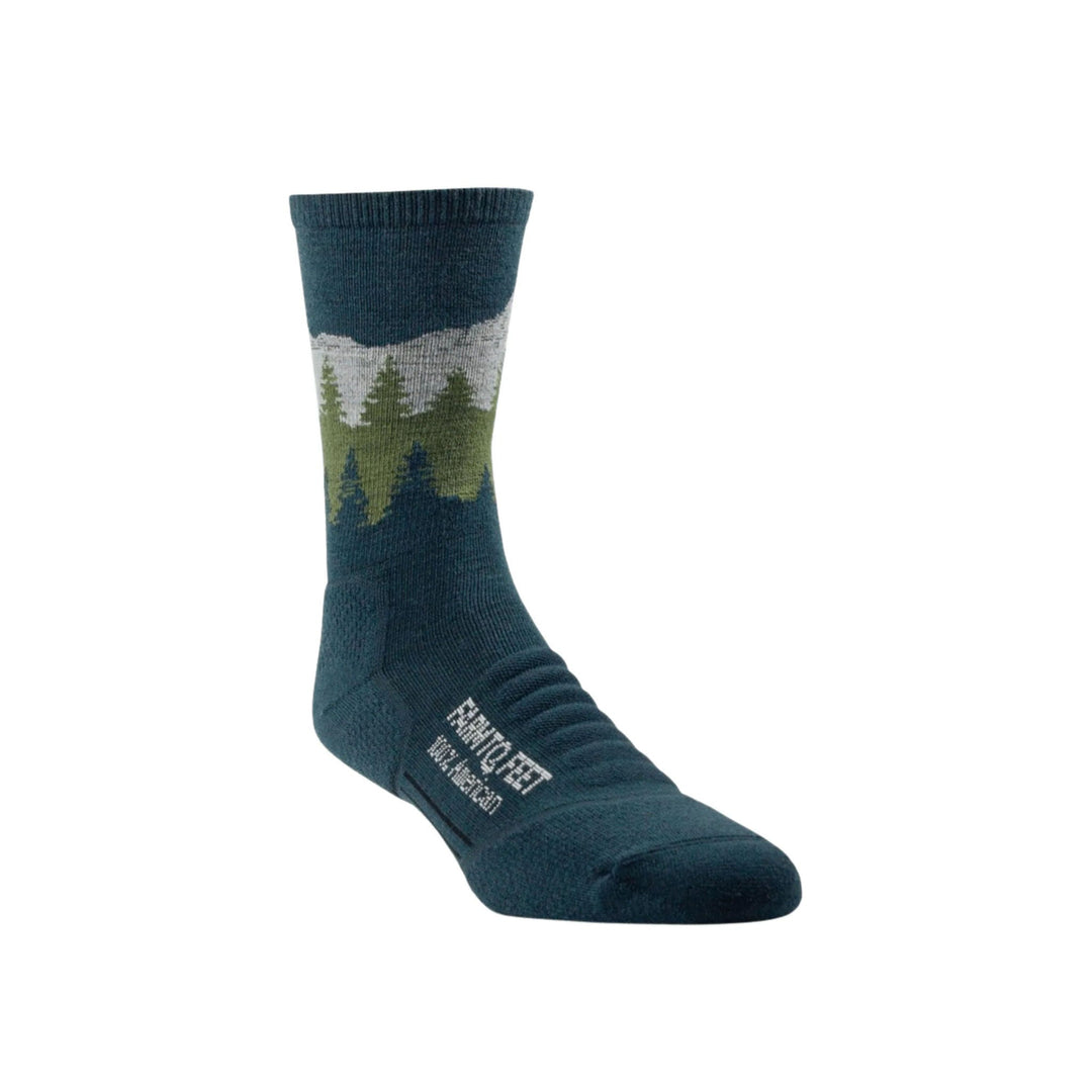 Dark teal crew sock with forest landscape pattern and visible Farm To Feet text