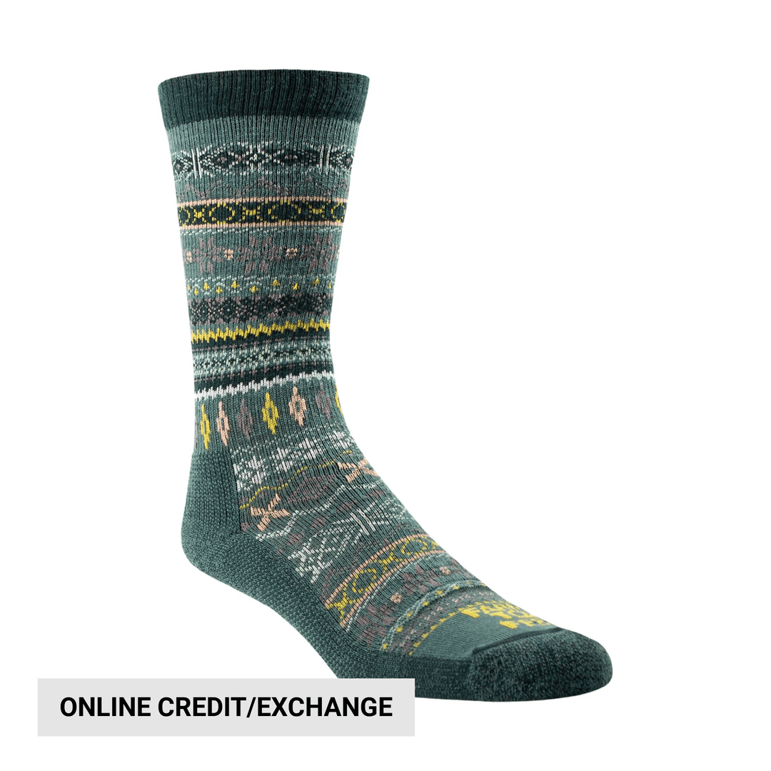 Green patterned crew sock with dark cuff and toe, shown at an angle