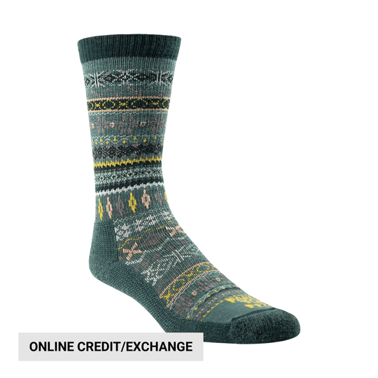 Green patterned crew sock with dark cuff and toe, shown at an angle