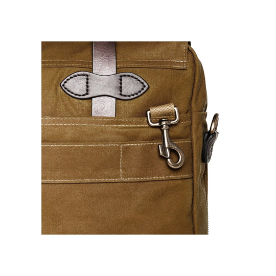 Tan canvas briefcase pocket detail with leather strap, metal hook clasp, and side D-ring
