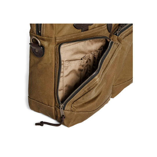 Tan canvas briefcase with leather handles, zippered exterior pockets, and a front zip pocket open